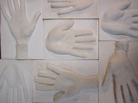 The beginning of the mould making process. Hand casts are taken in plaster of paris