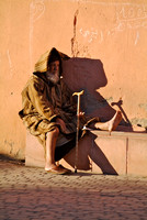 Old man resting in the evening sun, Marrakech