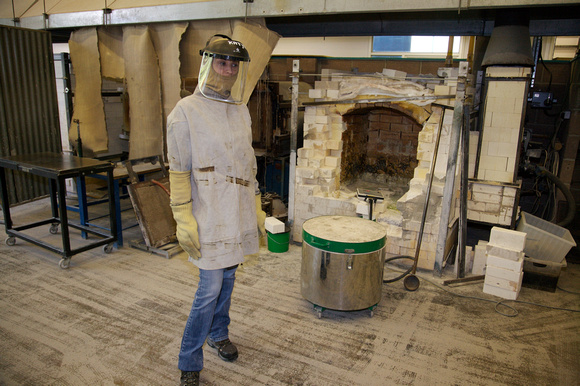 Preheating the extra glass in a kiln to prevent it exploding.