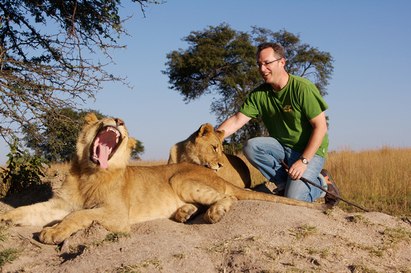 Chris Blade with lions at Antelope Park